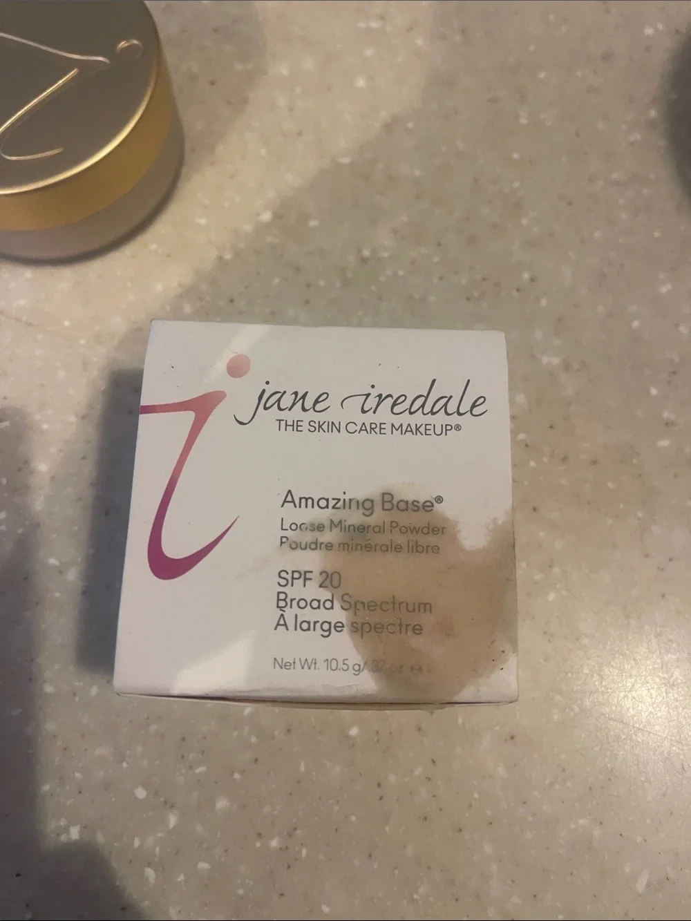 Jane iredale amazing base Golden glow new never used box is damaged.